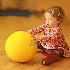 Little Girl Doing a Class